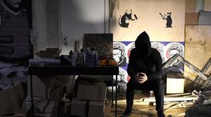 Une œuvre de Banksy s'autodétruit en pleine vente aux enchères (VIDEO)